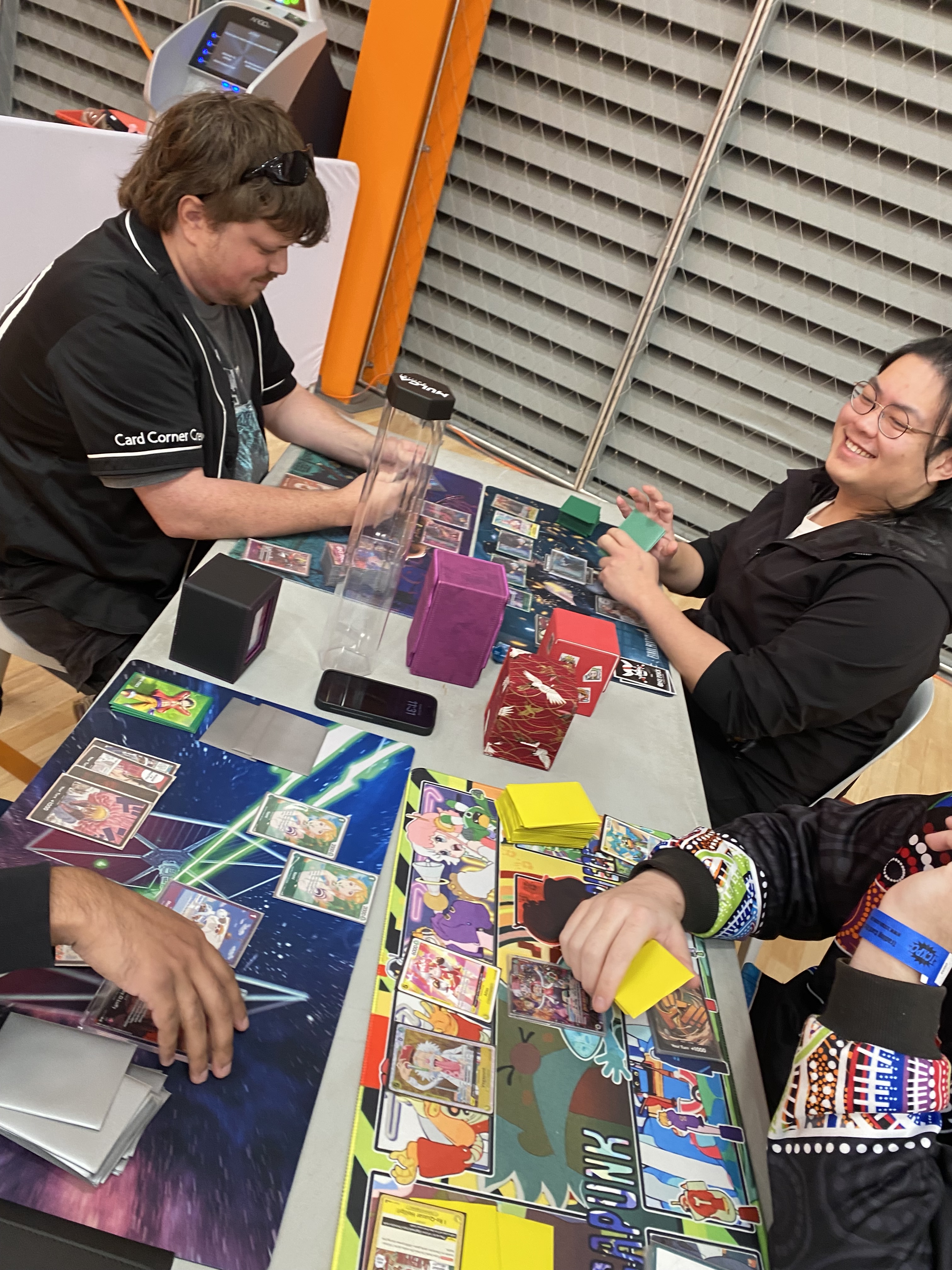 Attendees participating in One-Piece tournament at TCXPO