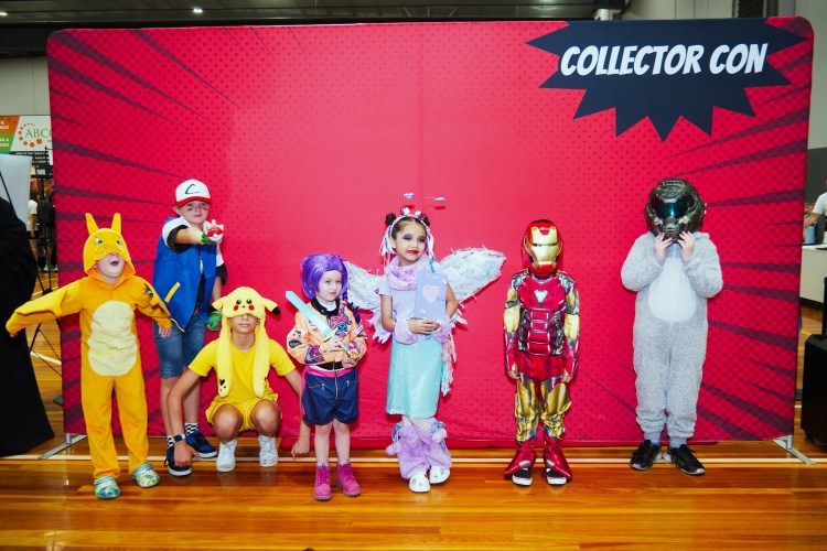 Kids in cosplay striking a pose during the cosplay competition